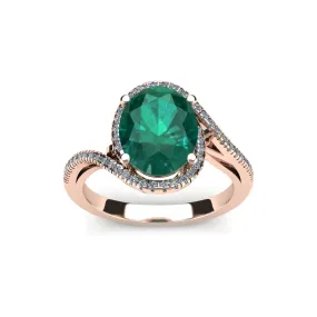 1 Carat Oval Shape Emerald And Halo Diamond Ring In 14 Karat Rose Gold